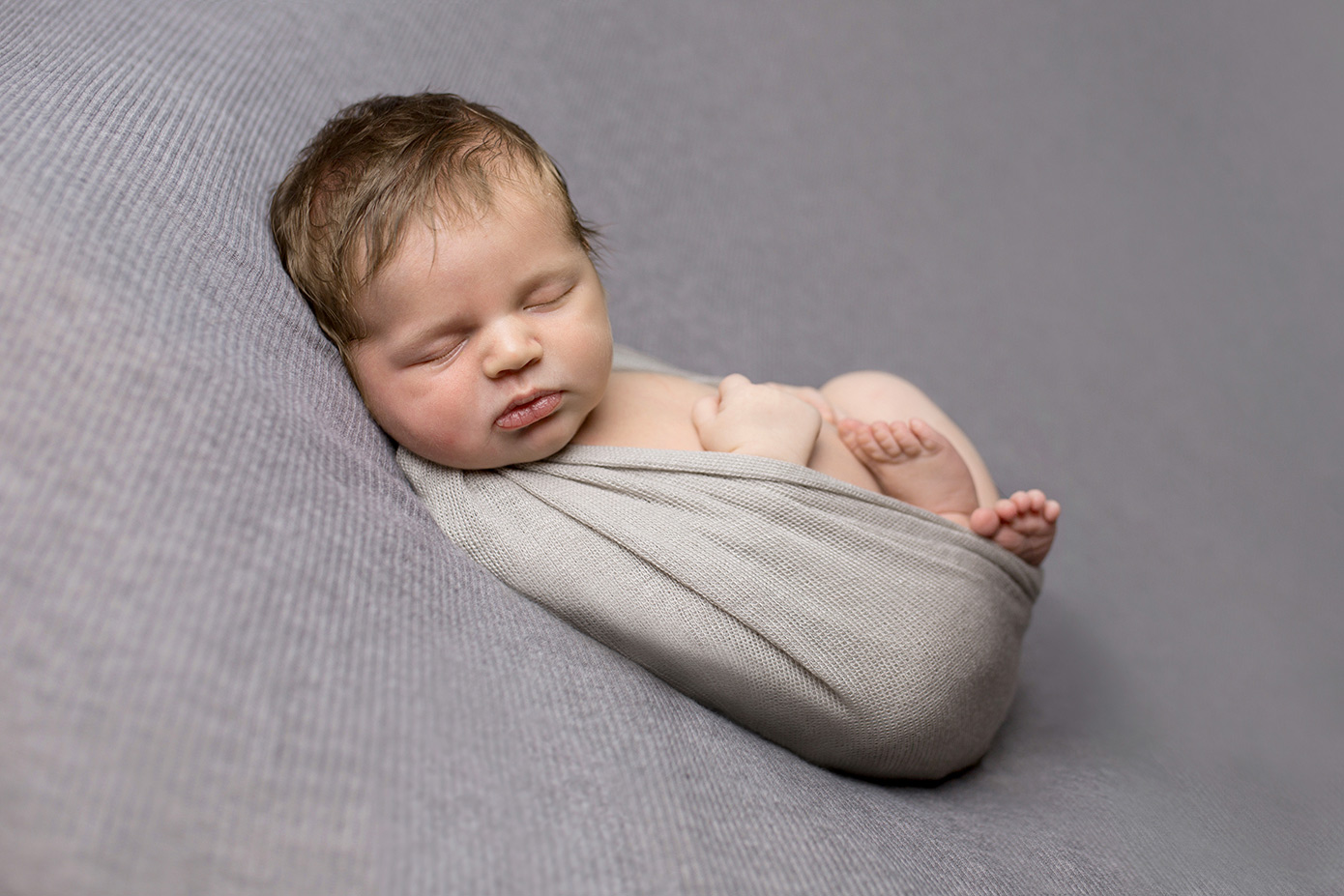 newborn huck finn pose grey 