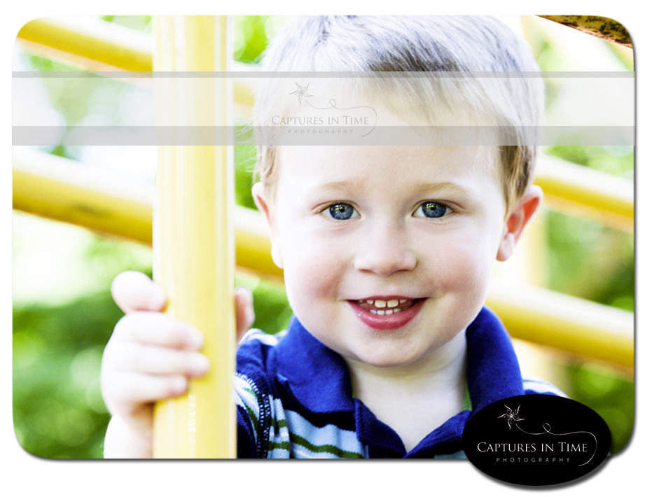 Kansas City Child Photographer boy on a playground