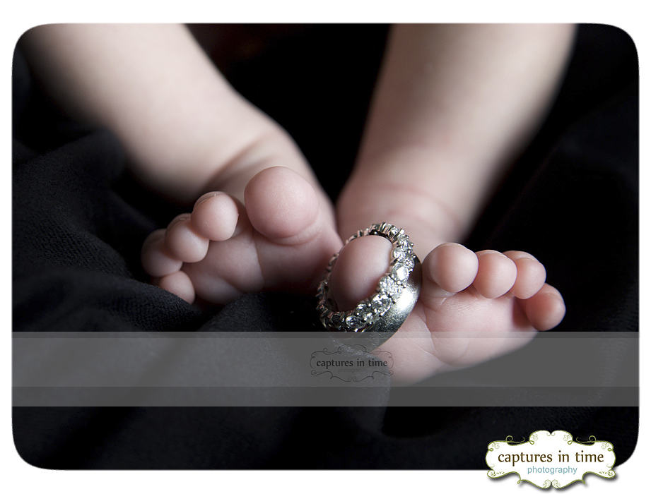 newborn feet with rings on toes