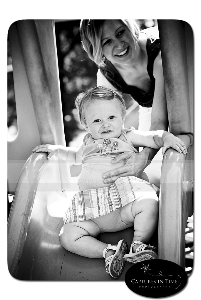 Kansas City Child Photographer baby going down slide with mom English Landing