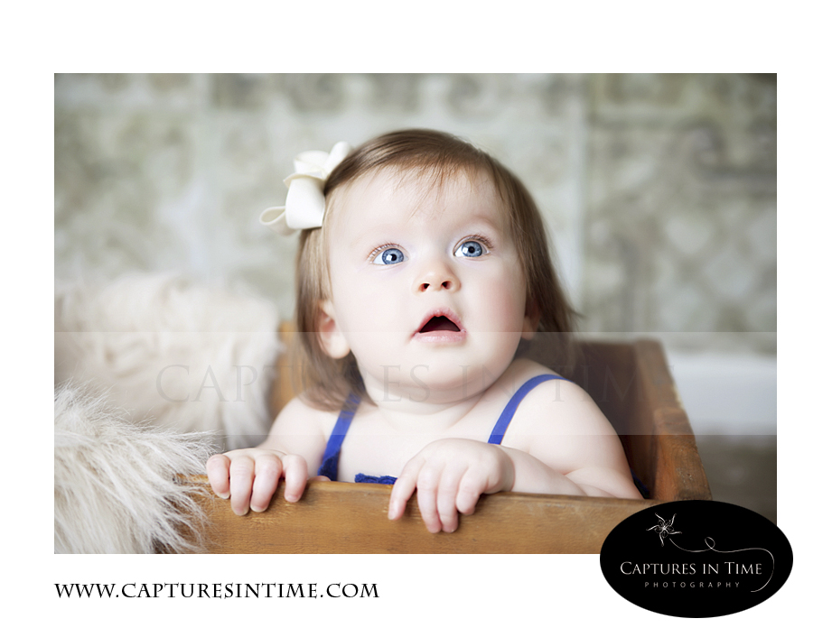 Adorableness Kansas City Photographer one year old in wooden box