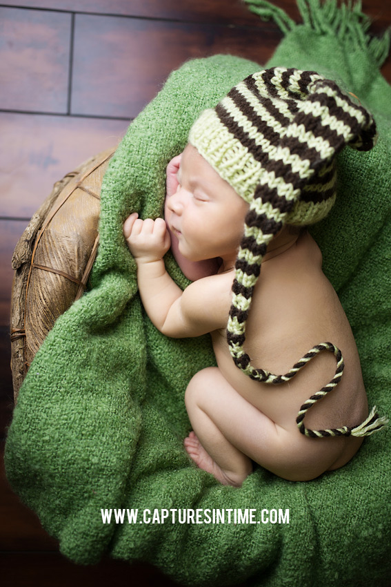 kansas city newborn on green blanket